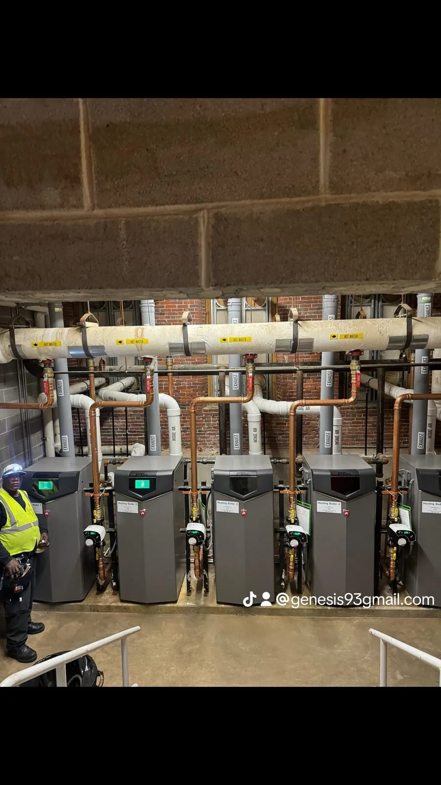 Five high-efficiency boilers with insulated hot water mains overhead
