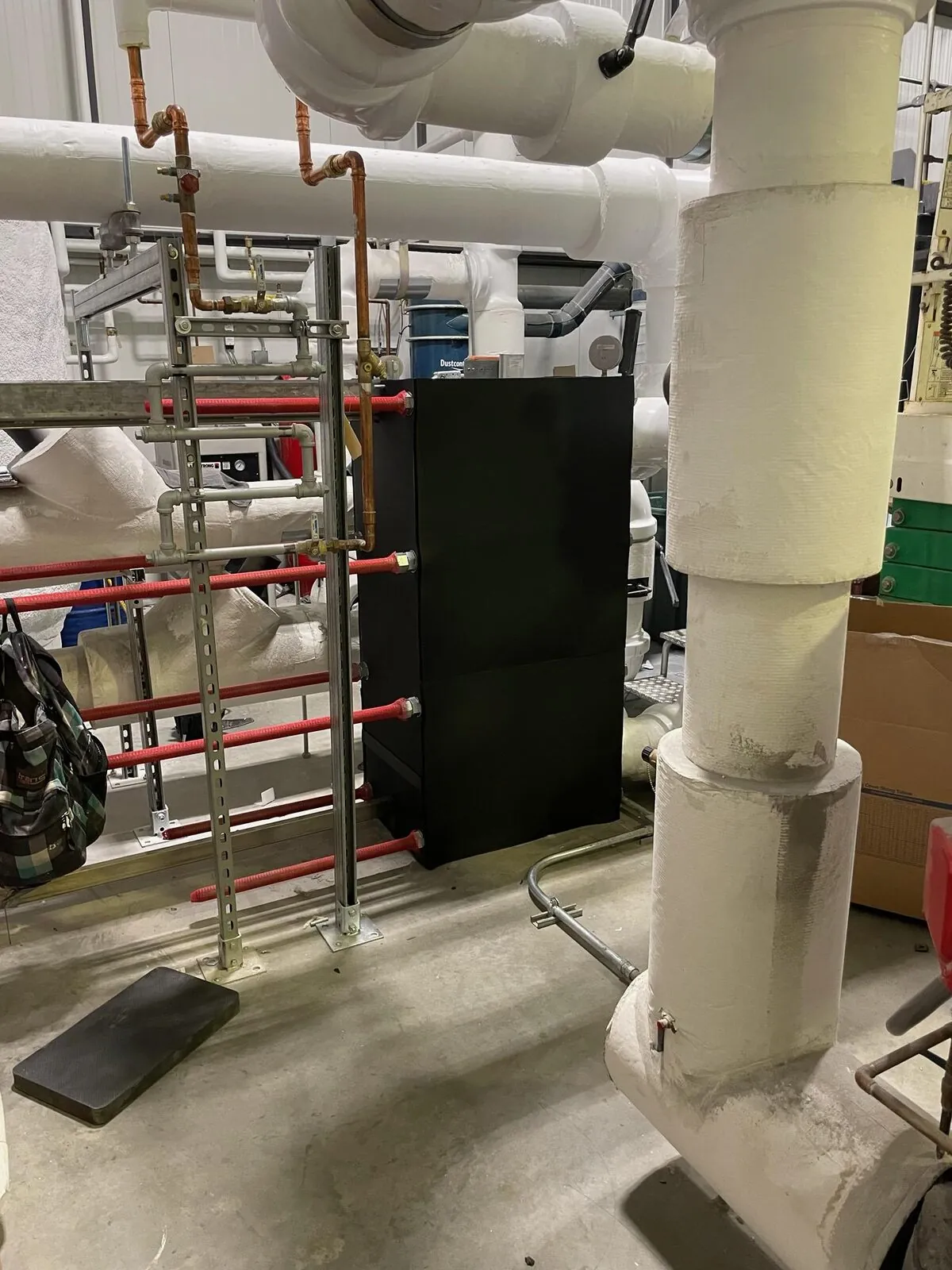 Insulated equipment with copper service piping in mechanical room